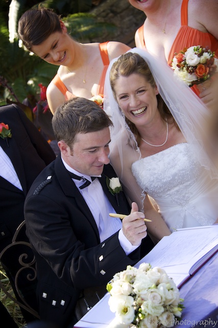 Signing the register - wedding photography